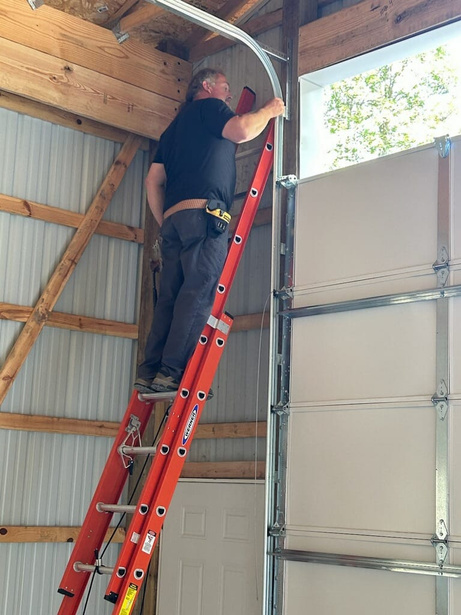 Dan on a ladder